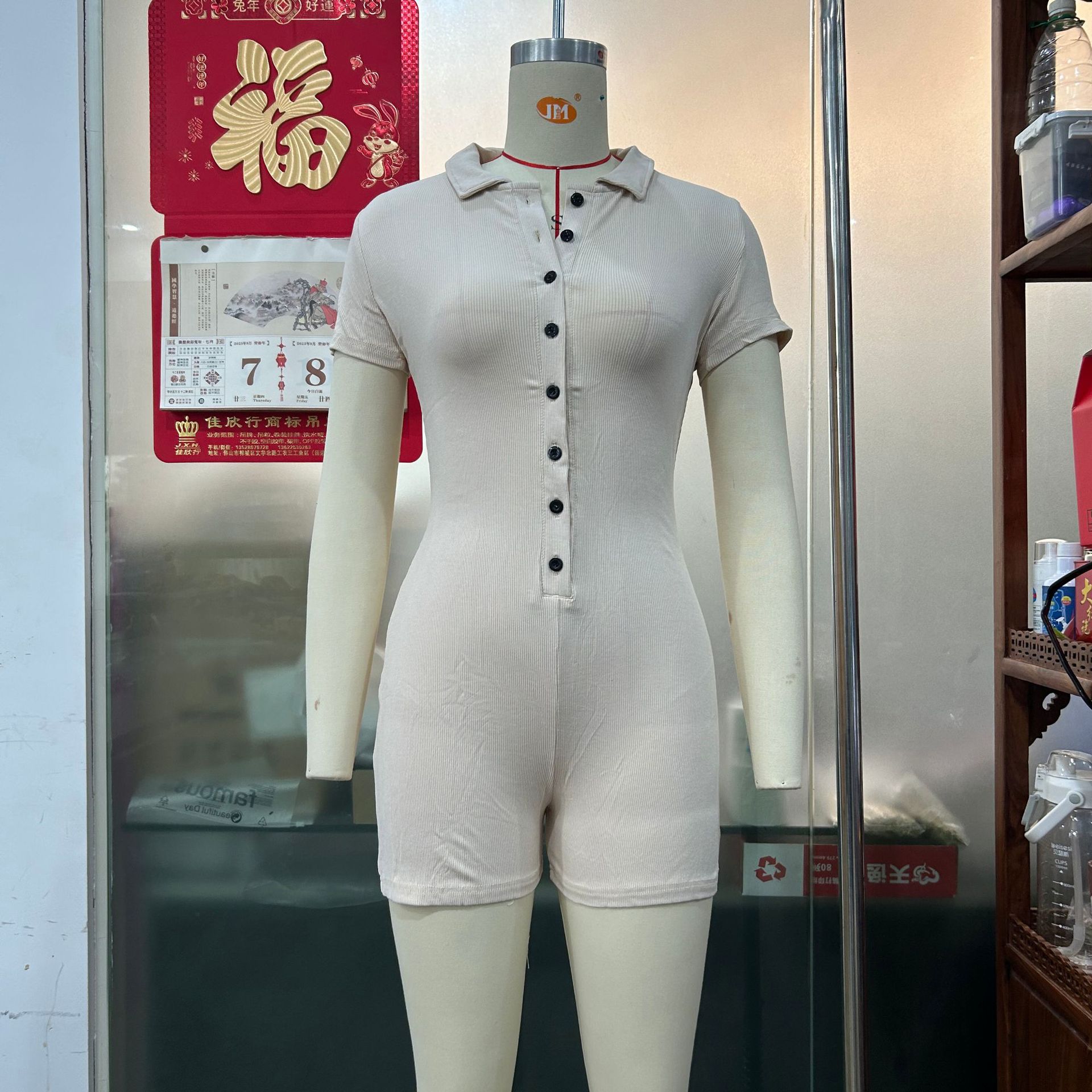 Mono de las mujeres europeas y americanas deportes casual Polo cuello solapa cardigan sexy de un solo pecho shorts mono 3135