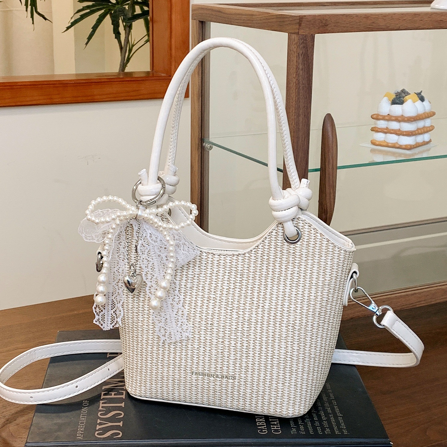 Bolsos de alta gama para mujer 2025 nuevo bolso de cubo popular moda bolso de hombro de todo fósforo bolso de mensajero de cercanías