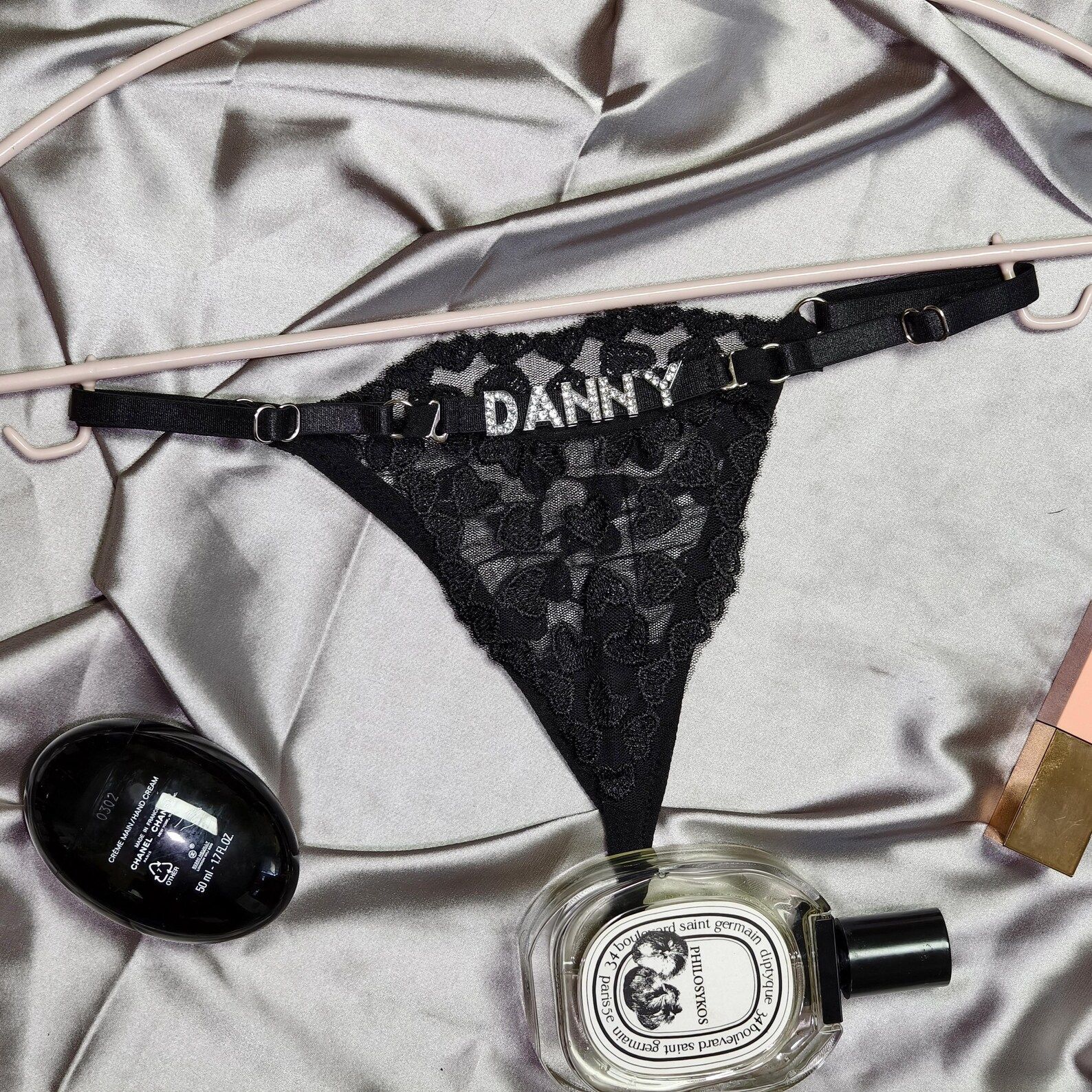 Transfronterizos europeos y estadounidenses sexy de encaje de diamante letras ajustable de cintura baja thongs transparente sexy vacío ropa interior de mujer