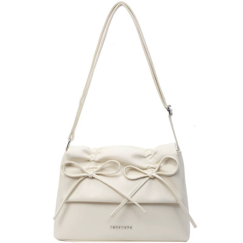 Capacious shoulder bag, one-shoulder bag with bow, western style