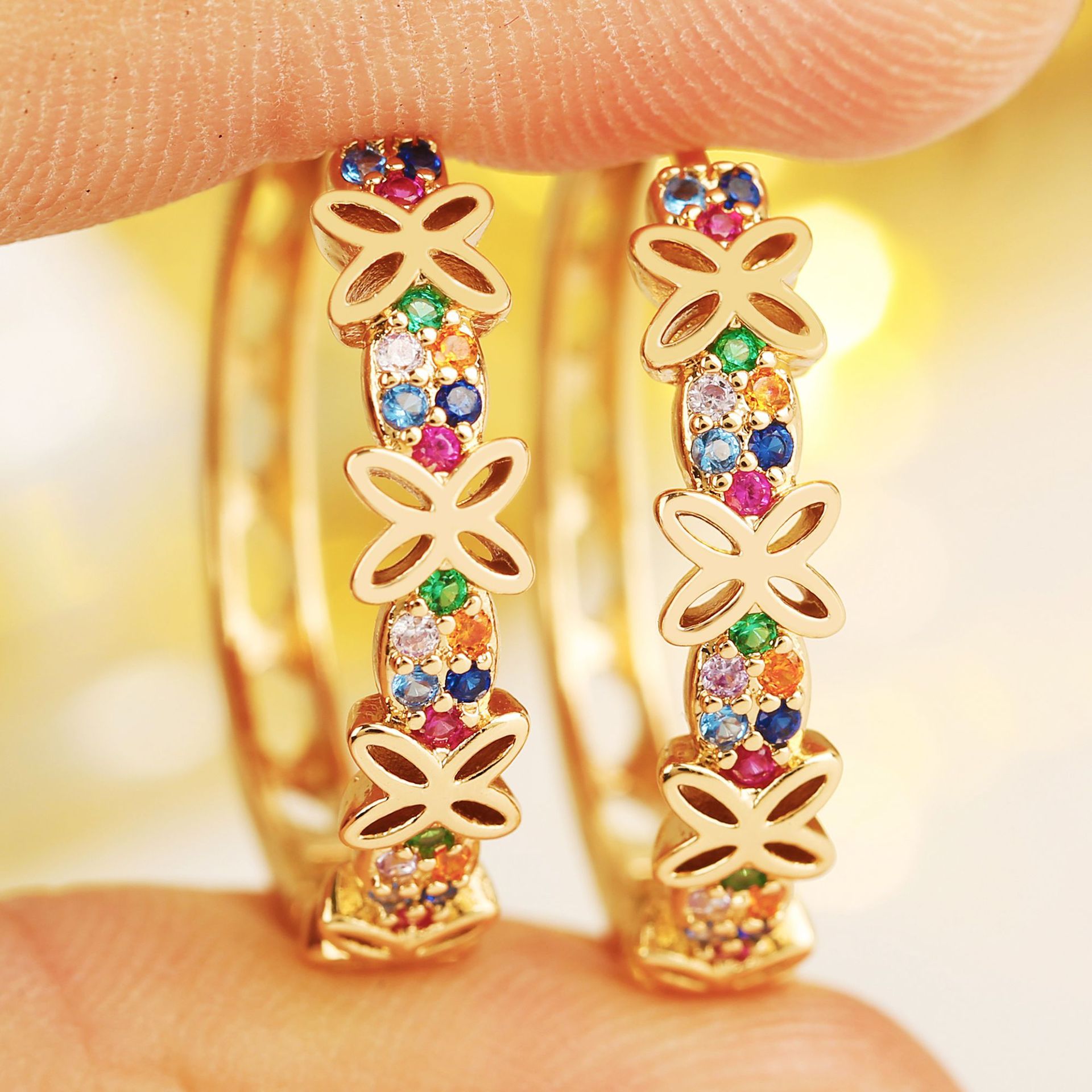 Yanbai temu cross-border light luxury plum blossom copper inlaid zircon earrings for women, niche high-end simple fashion versatile earrings