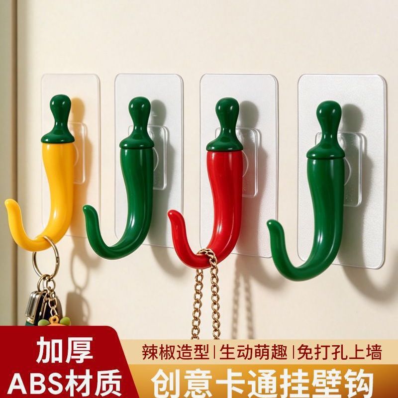 Chili-shaped adhesive hook, strong adhesive, no-drill required, creative entryway wall-mounted key hook Chili-shaped adhesive hook, strong adhesive, no-drill required, creative entryway wall-mounted key hook