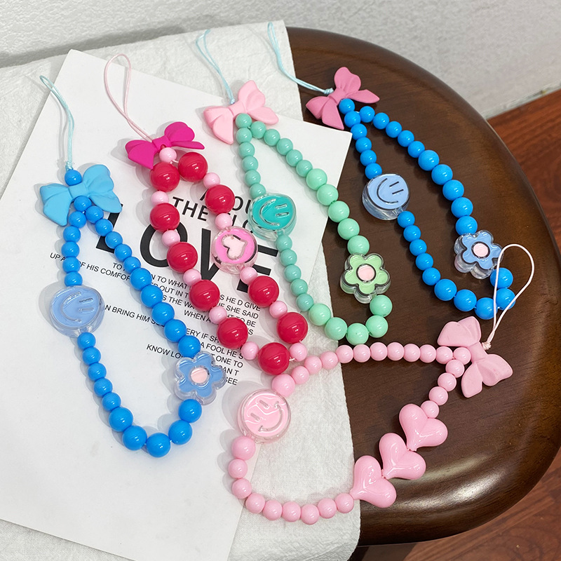 New acrylic beaded mobile phone chain personalized creative color bow mobile phone lanyard anti-fall wrist strap