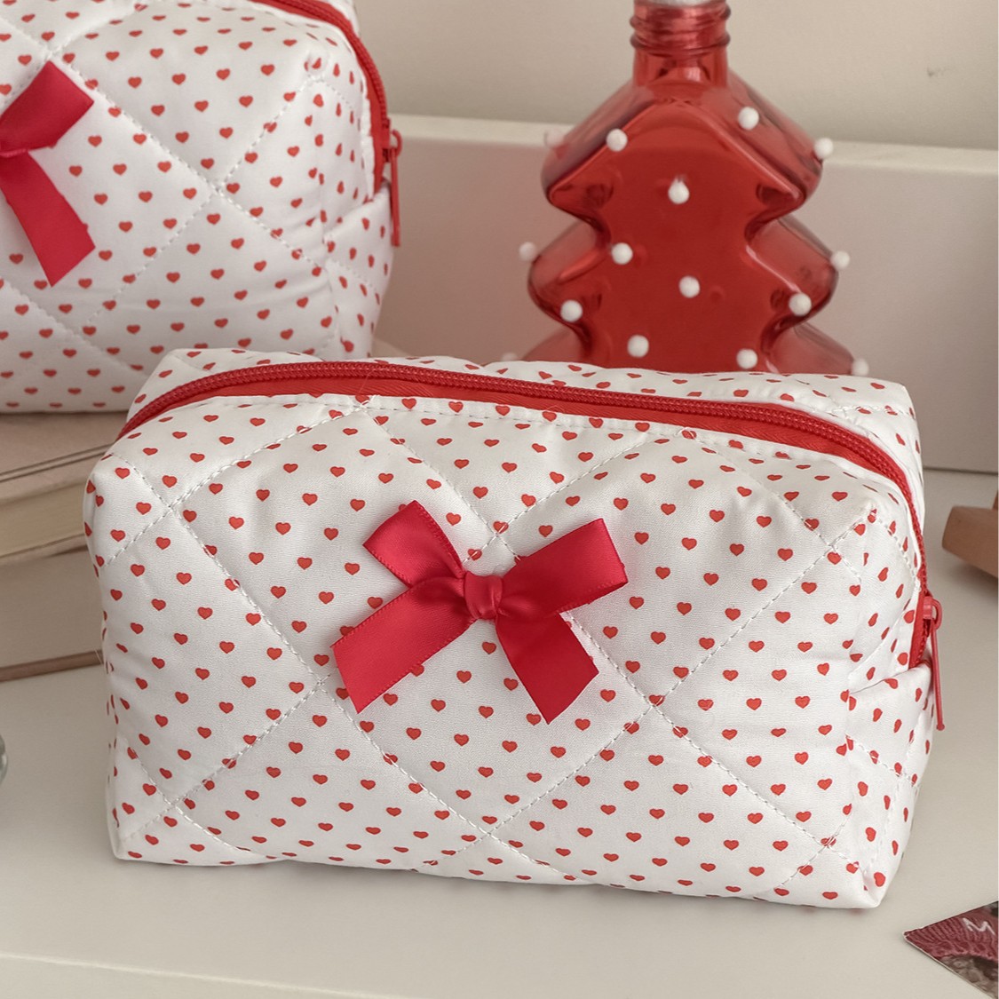 Cross-border e-commerce red heart-shaped storage bag, high-value Korean style bow-knot large capacity portable quilted cosmetic storage bag