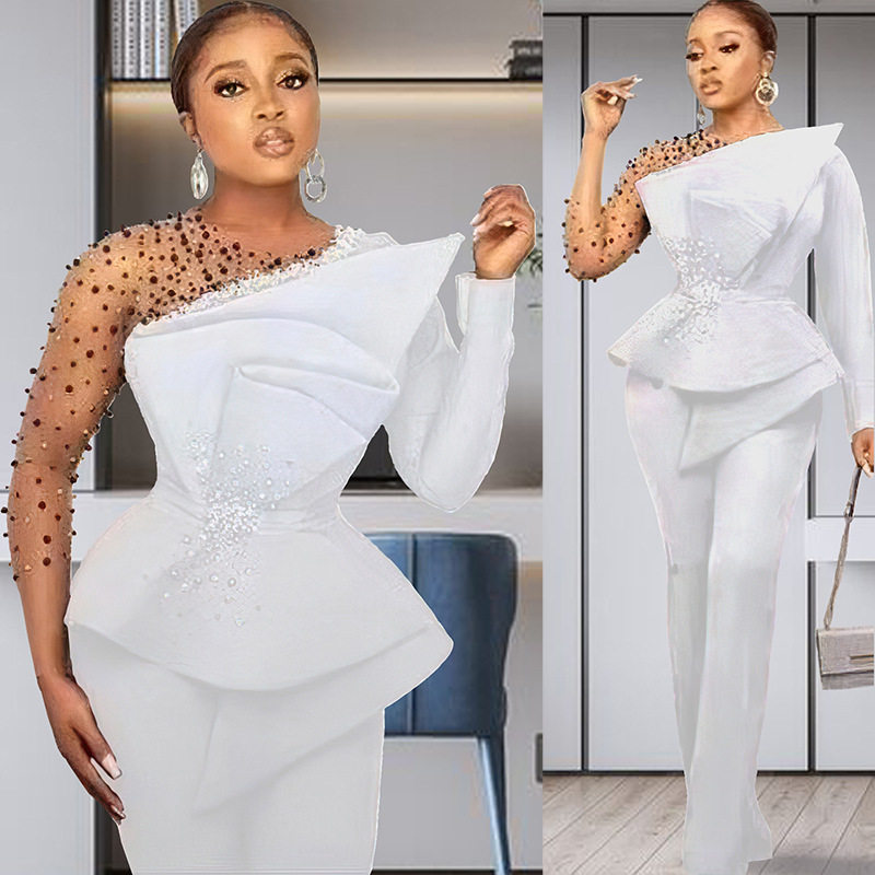 Completo pantalone donna taglie forti con dettagli in mesh e perle_voghion.com