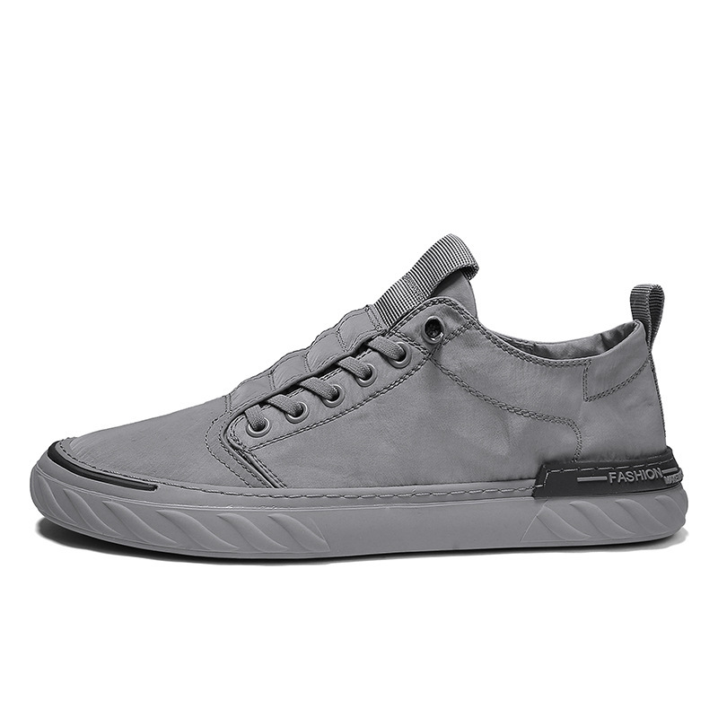Primavera nueva seda de hielo transpirable viejos zapatos de tela de Beijing estilo coreano zapatos de moda universal zapatos de lona casuales para hombres