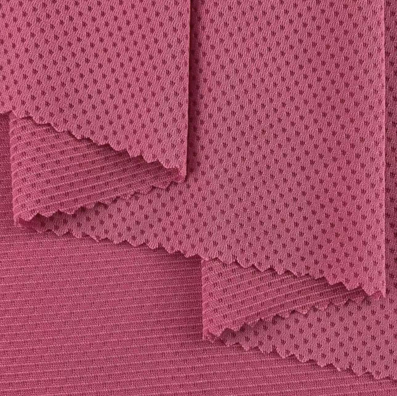 Spot Shuangyi.com Promoción especial poliéster absorbente de humedad rápida secado deportivo tela de malla Jacquard panal