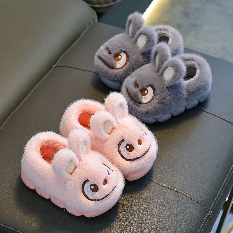 Otoño y invierno zapatillas de algodón para niños y niñas calientes y pelusa para padres e hijos antideslizantes con suela gruesa bolsas de niños y zapatos de algodón