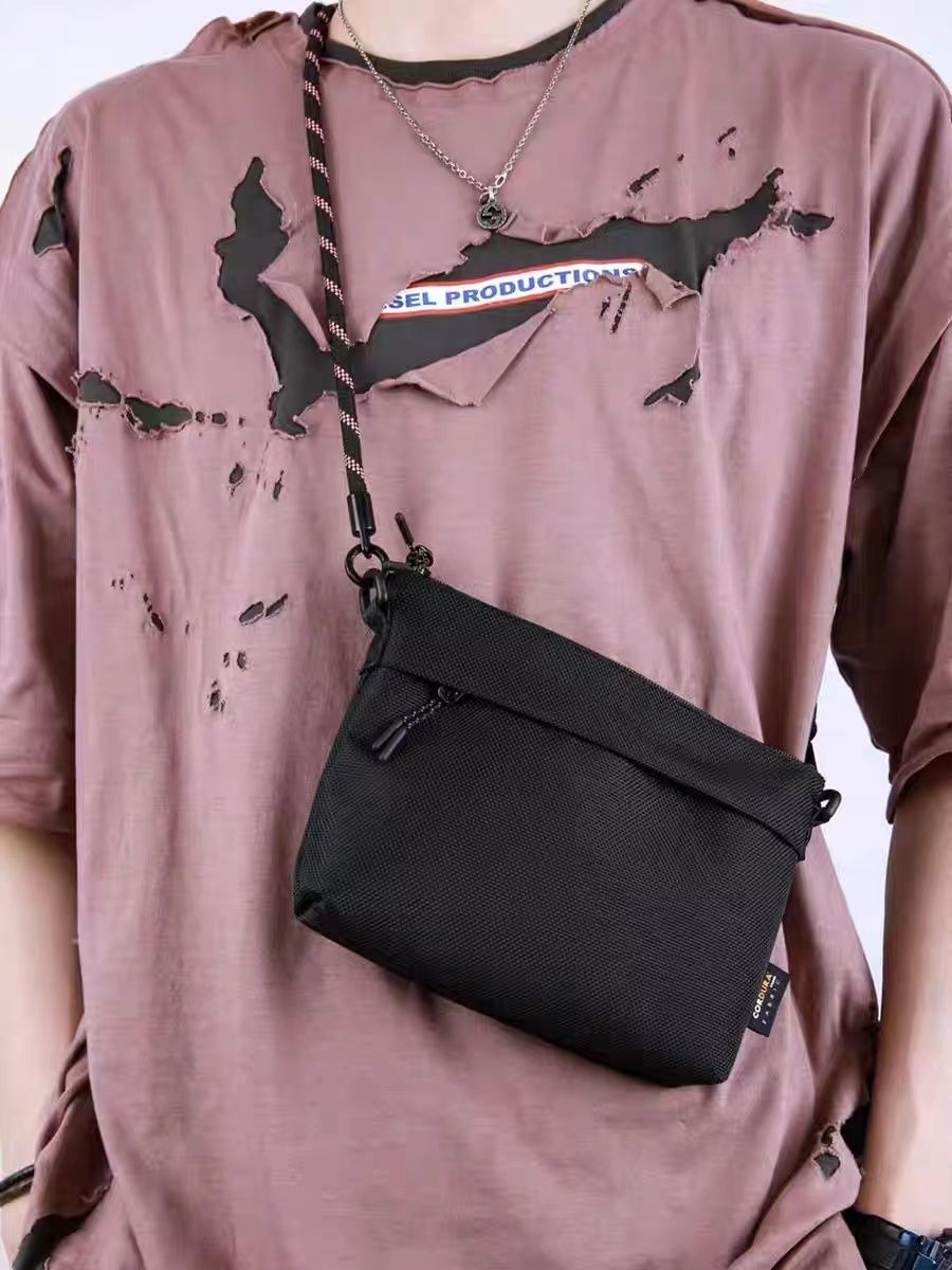 Bolsa de hombro de hombre nueva moda impermeable móvil mochila pequeña mochila casual de gran capacidad mochila