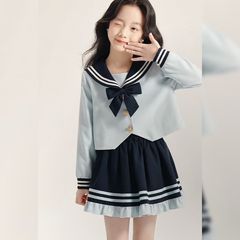 女の子の韓国版の流行のスカートのスーツの中で大きい子供の春秋の新型の洋気の海軍の襟の上着は色の短いスカートの2つのセットをつづり合わせます。