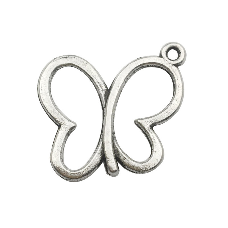 Venta transfronteriza de colgante de aleación de plata Xizanga con forma de mariposa, hecho a mano, para collar, pulsera, accesorio de joyería, venta al por mayor.