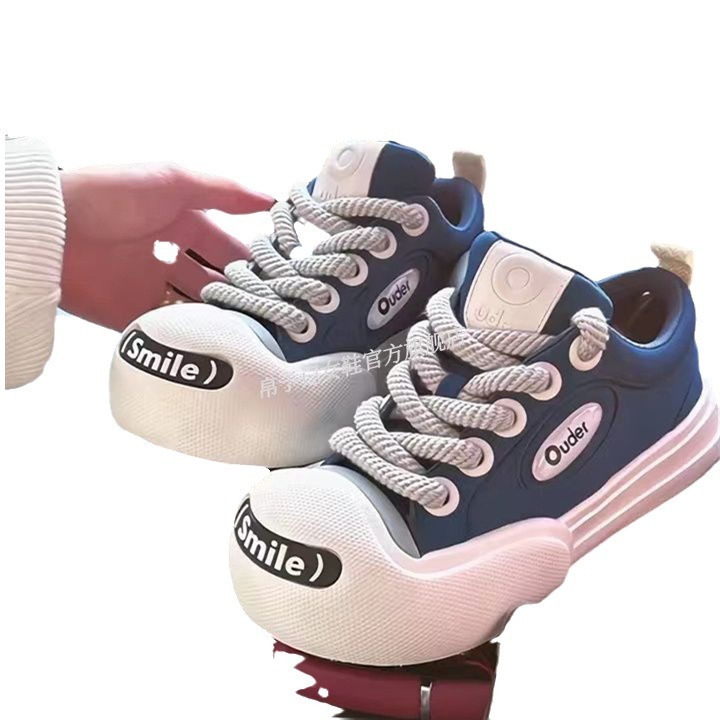 Casual breathable boca abierta sonrisa lesbiana pareja zapatos de lona baja altura negro y blanco zapatos de skate-ins mujer