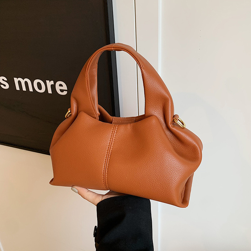 Bolso de textura transfronteriza 2025 primavera nuevo bolso femenino retro patrón de lichi bolso de hombro transmisión en vivo el mismo bolso de mensajero