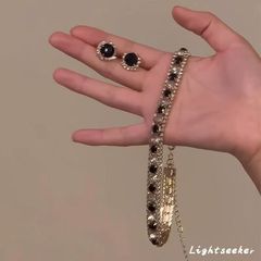 フランス式のヘボン風の黒い円いっぱいのドリルのネックレスの暗黒系の宮廷の復古のパンク風の鎖の骨のチェーンの同項のピアス