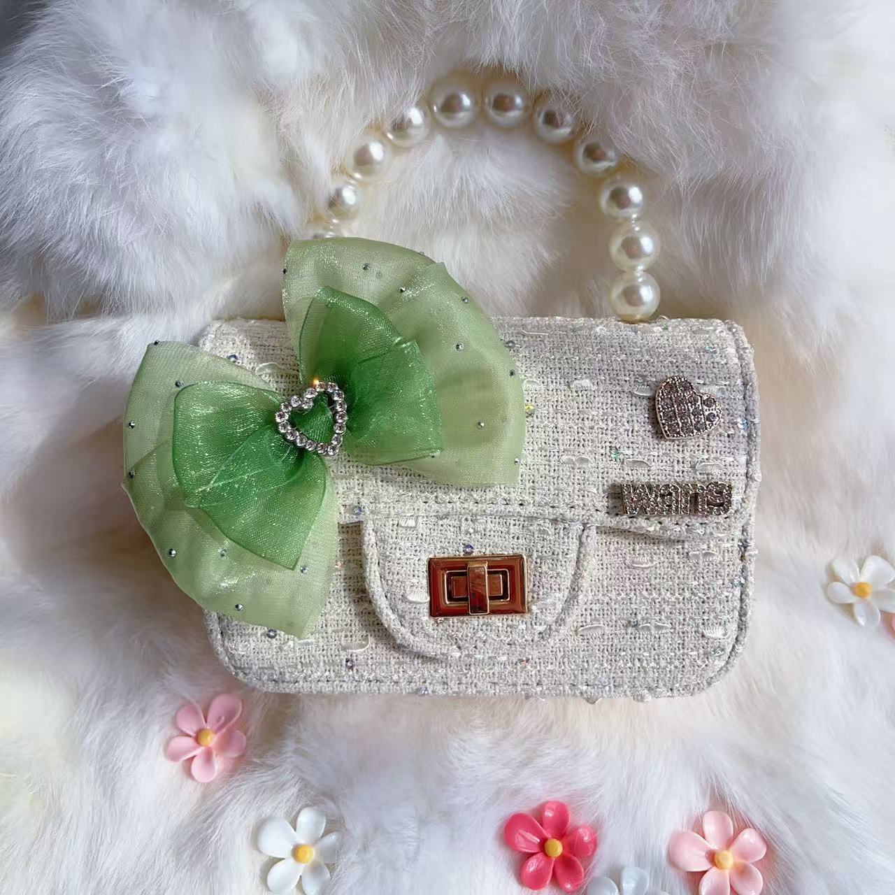 Nuevo tipo de bolsos para niños, bolsos de moda, bolsos de princesa de viento, bolsos portátiles lindos para chicas, bolsos de red para bebés.