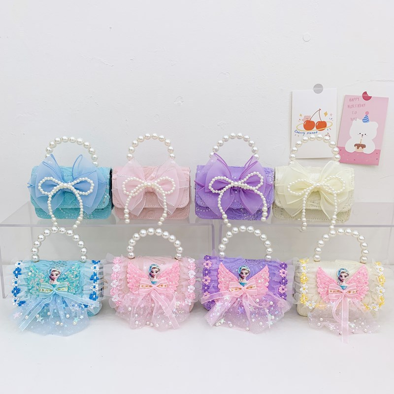 Nueva princesa flor de encaje niñas mochila de hombro de moda perla arco bolso de niños bolso de cambio de dibujos animados
