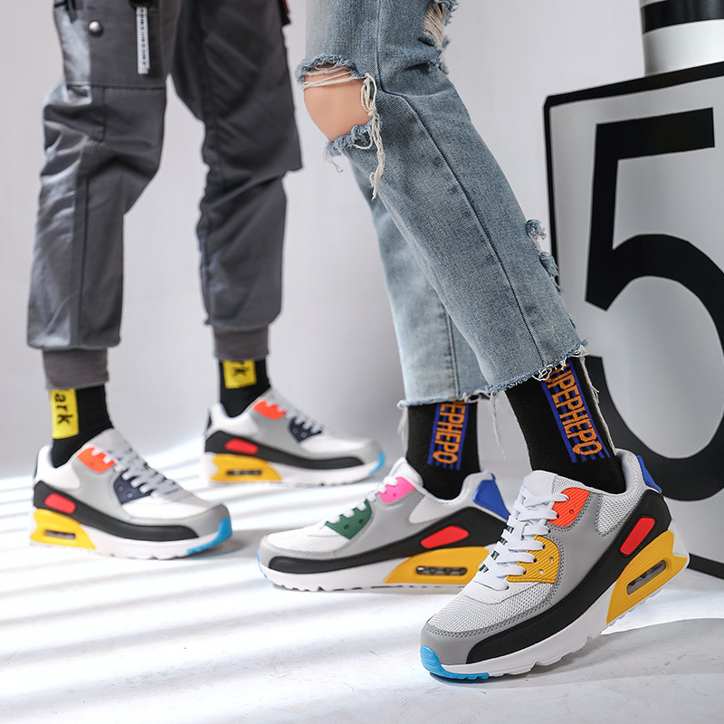 Pareja de zapatillas de deporte de cojín de aire para hombres y mujeres transfronterizas más el tamaño de zapatos casuales ligeros a juego de color de moda de malla transpirable zapatos para correr