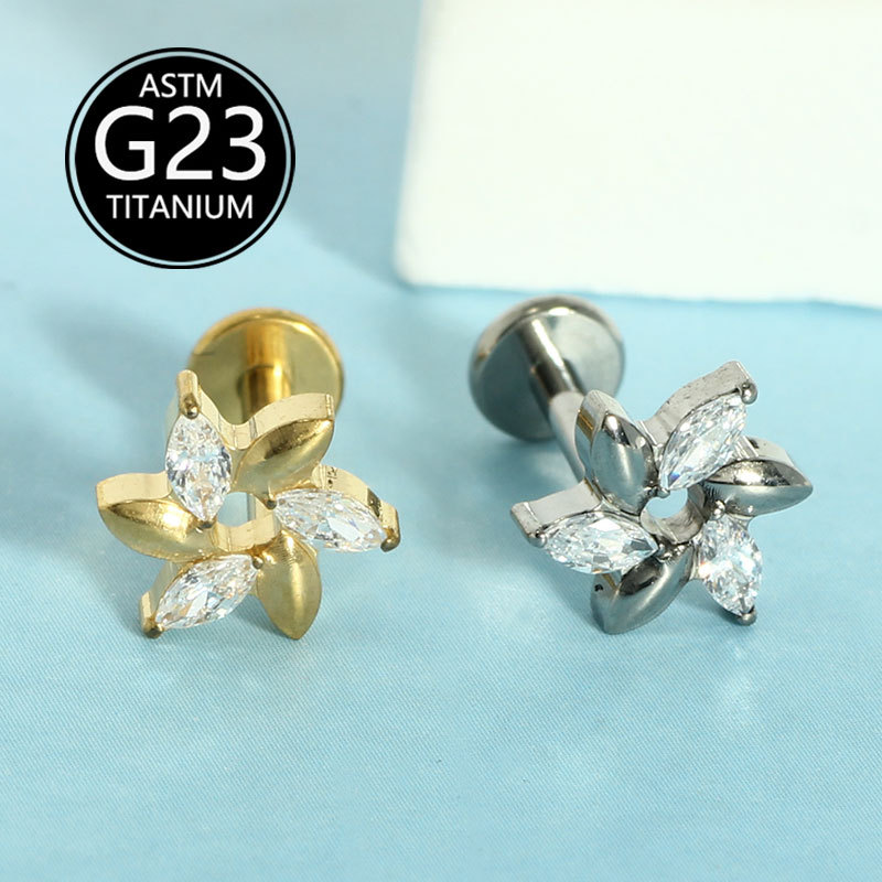 Silver pointed spike labret stud material detail