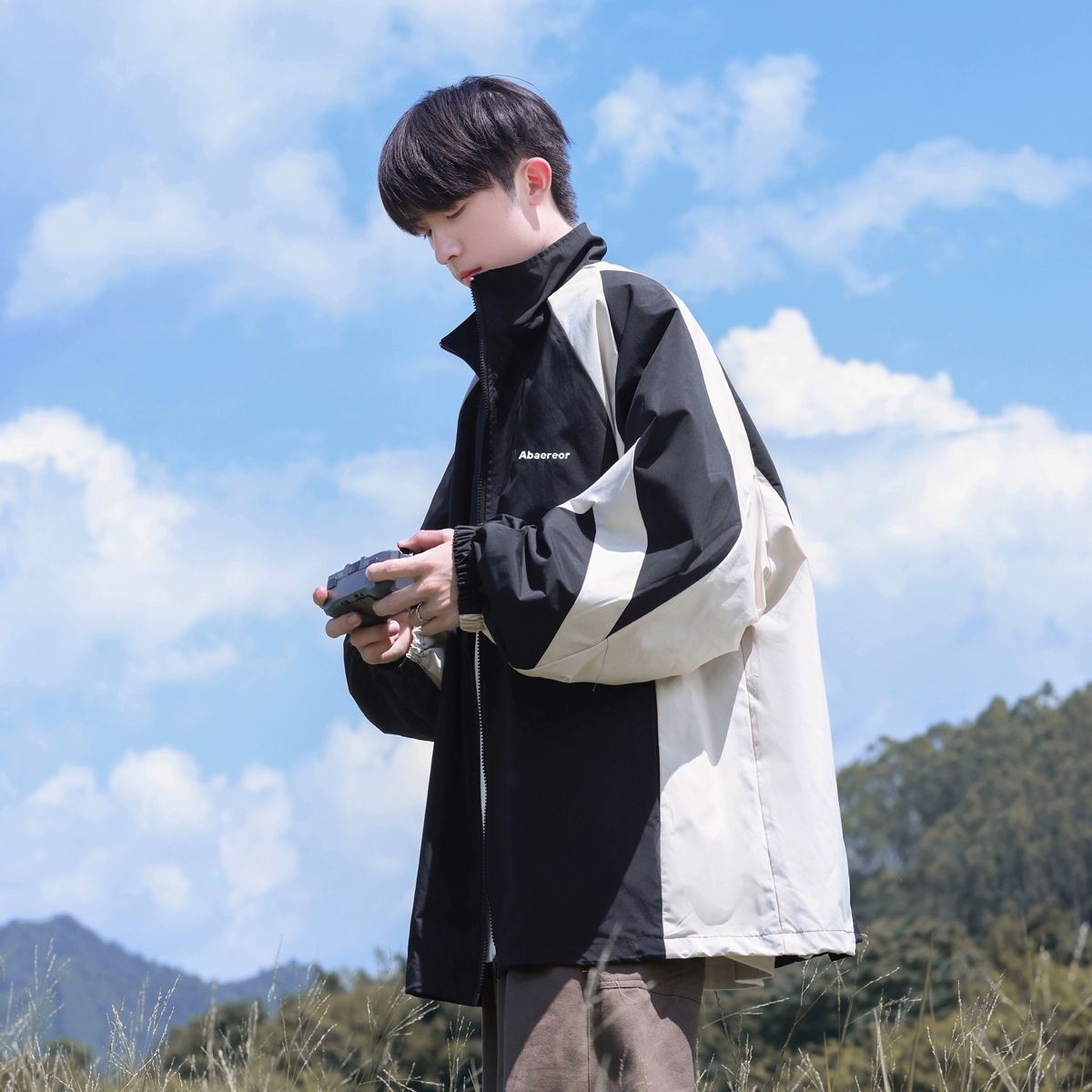 Chaqueta de cuello alto de estilo americano para hombres otoño 2023 nueva chaqueta deportiva de protección solar funcional de ocio al aire libre