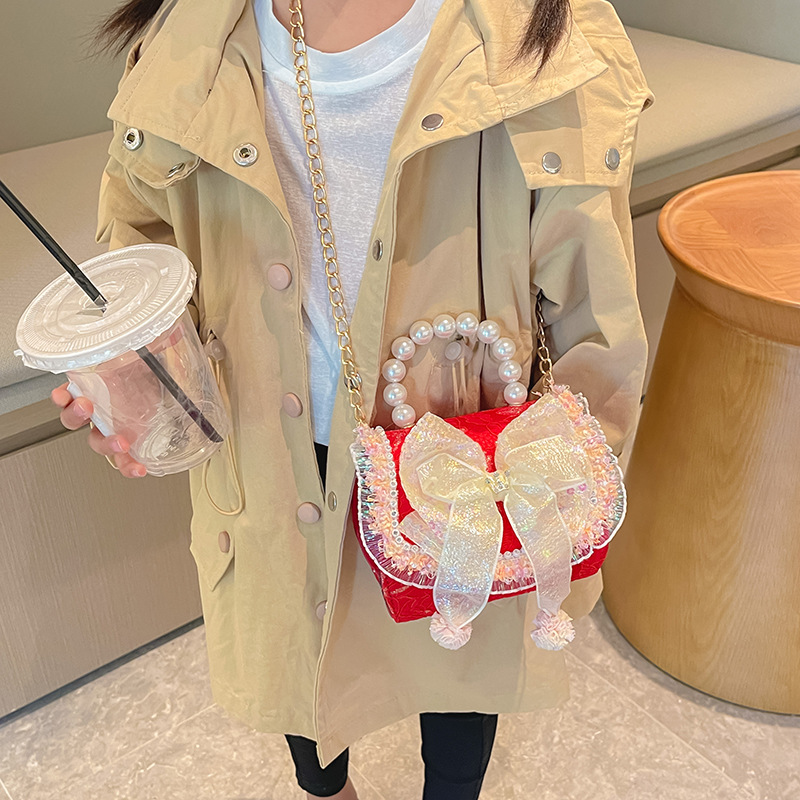 Bolso infantil de perlas 2024 nueva chica arco de moda, bolsa de tramo inclinada, princesa de moda, accesorios de algodón y lino, bolso