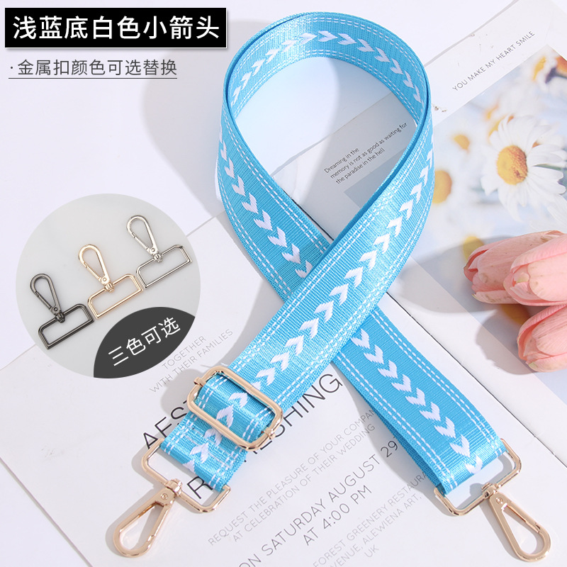 Small white arrow on light blue background