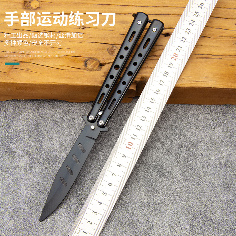 现货未开刃七孔手部运动训练折叠刀户外CSGO蝴蝶刀甩手花式刀