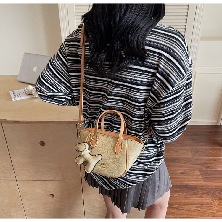 A high-end retro printed bucket bag for summer 2025, a trendy and versatile crossbody bag for women undefined