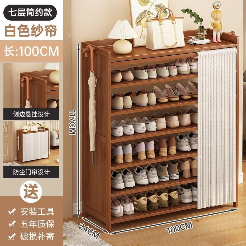 El dormitorio de la casa de alquiler de puerta de entrada para el hogar de varios pisos en la puerta del estante para zapatos ocupa un pequeño estante de almacenamiento, armario de zapatos simple a prueba de polvo