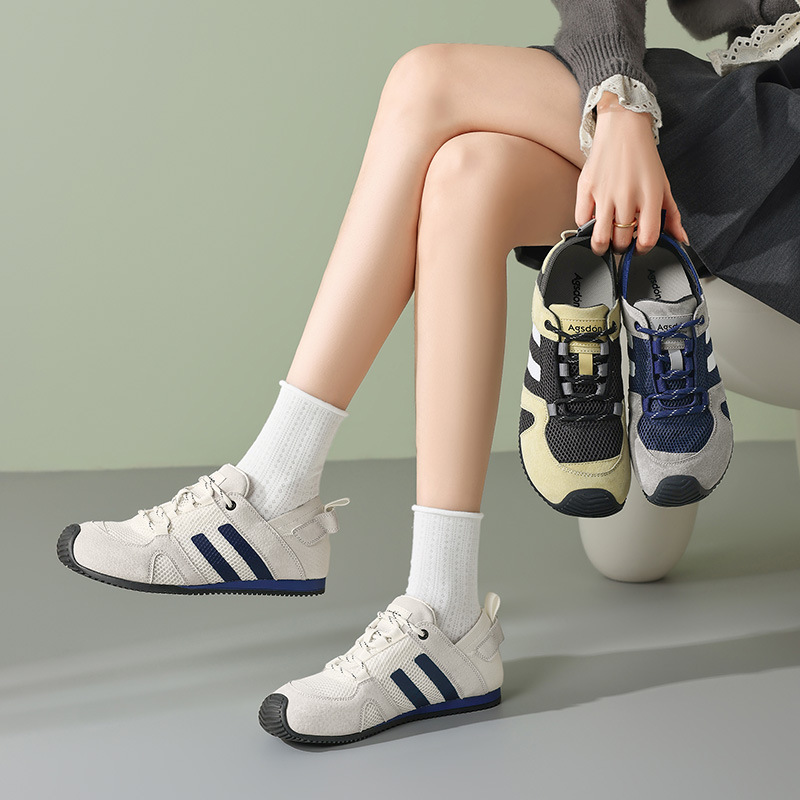 Zapatos de entrenamiento de la mujer 2025 nuevos zapatos blancos planos de verano de malla casuales Gump zapatos deportivos