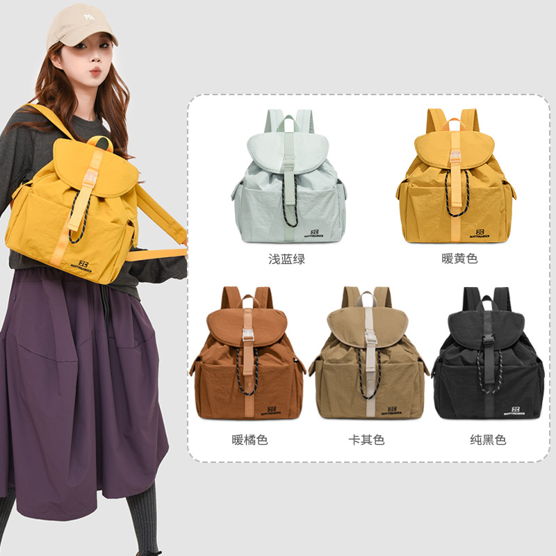 Mochila coreana simple de color sólido para niños y niñas, mochila escolar de gran capacidad 2026 nueva mochila infantil transfronteriza