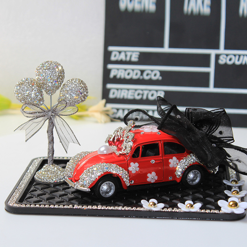 Modelo de coche, modelo de coche de arco creativo y colorido, adornos de diamantes, accesorios de interior de coche, decoración de tapete antideslizante de margarita pequeña