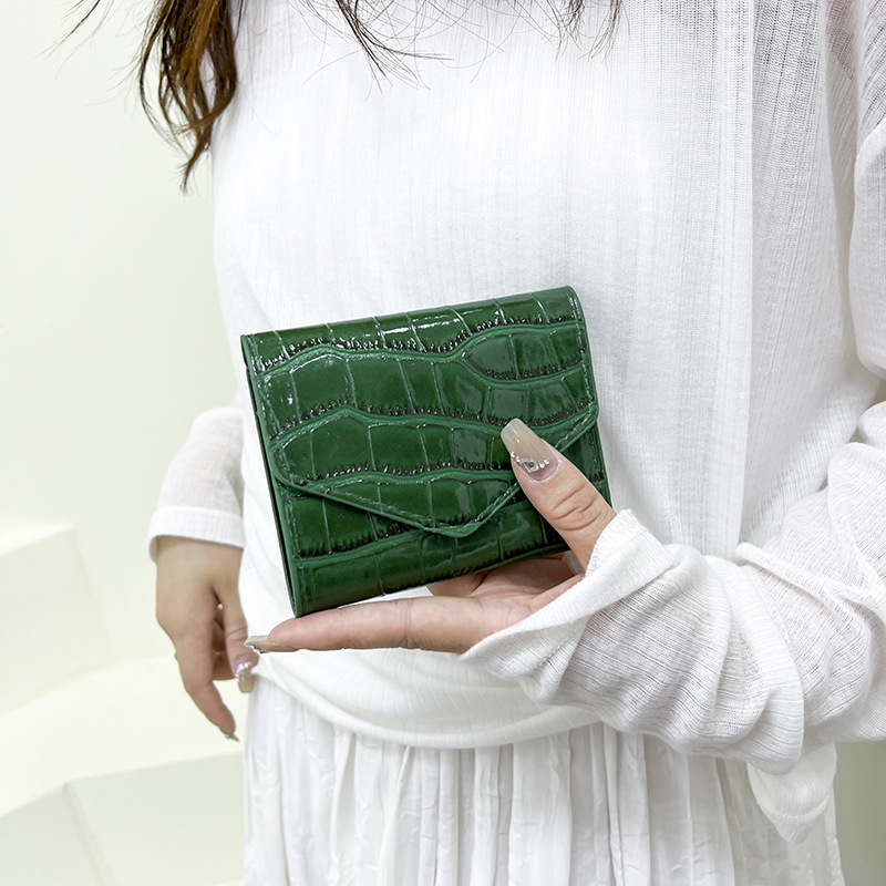 Personalidad textura casual tendencia simple bolsas de cena de color sólido de mujeres lápiz labial de moda de color sólido impresión bolsa de mano universal
