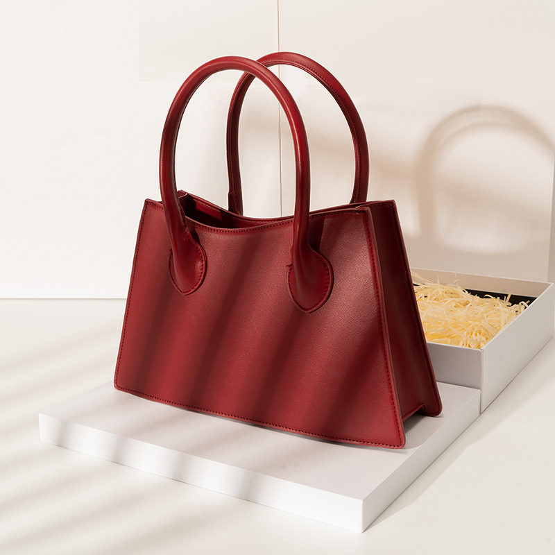 [Two Innocent] Bolso de mano rojo para boda, bolso de gama alta, bolso cruzado para mujer, para ir al trabajo, 2025