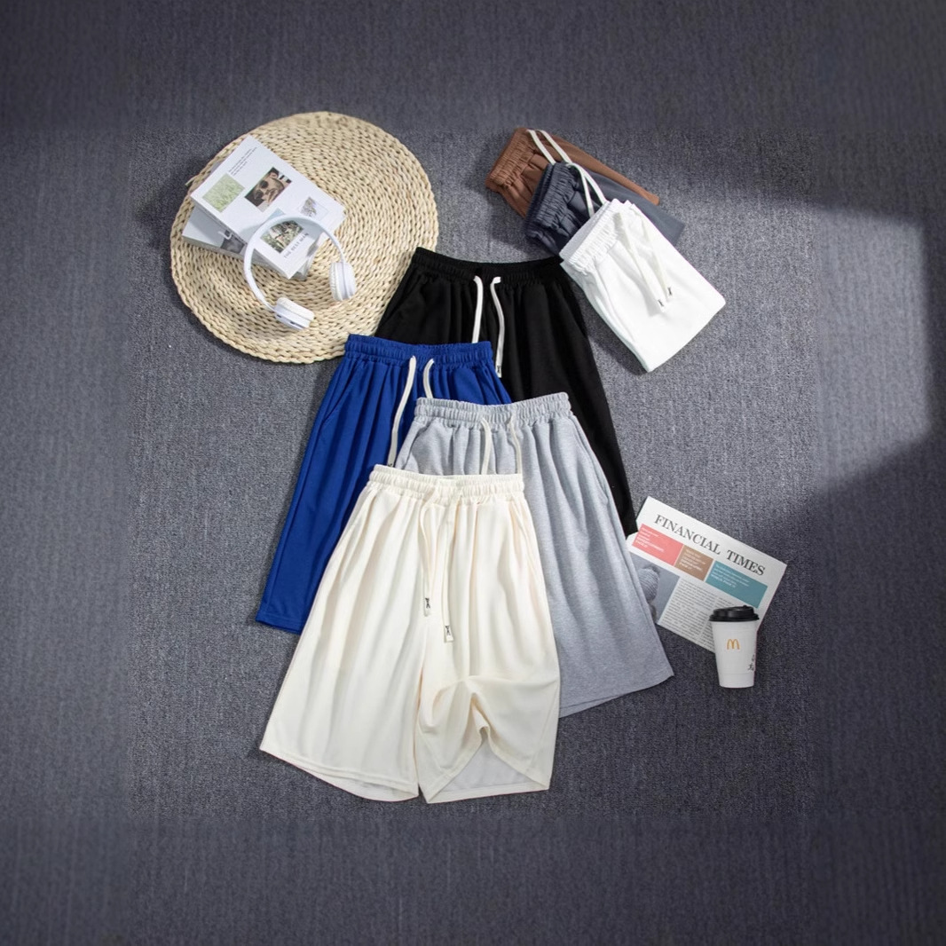 Hombre de verano casual holgado coreano waffle pantalon transpirable universal juvenil retro americano pantalones de cinco puntos