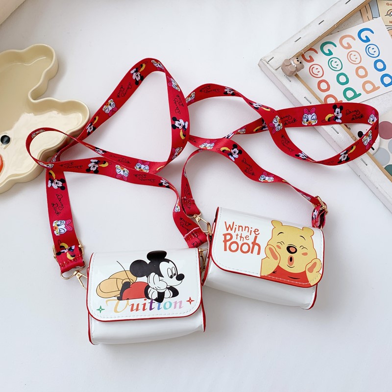 Los niños salen a la bolsa de cambio nuevo tipo mini bolso de moda fresco dulce caricatura para hombres y mujeres bolso de hombro