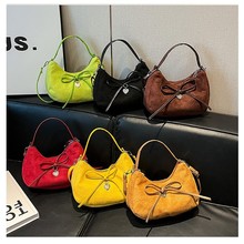 跨境复古麂皮绒饺子包韩版2025新款逛街出行手提蝴蝶结百搭单肩包