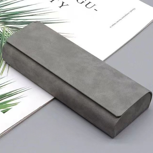 Caja de gafas portátil avanzada de cuero con hebilla magnética Caja de gafas de almacenamiento de compresión retro óptica Nueva caja de espejo simple antideslizante