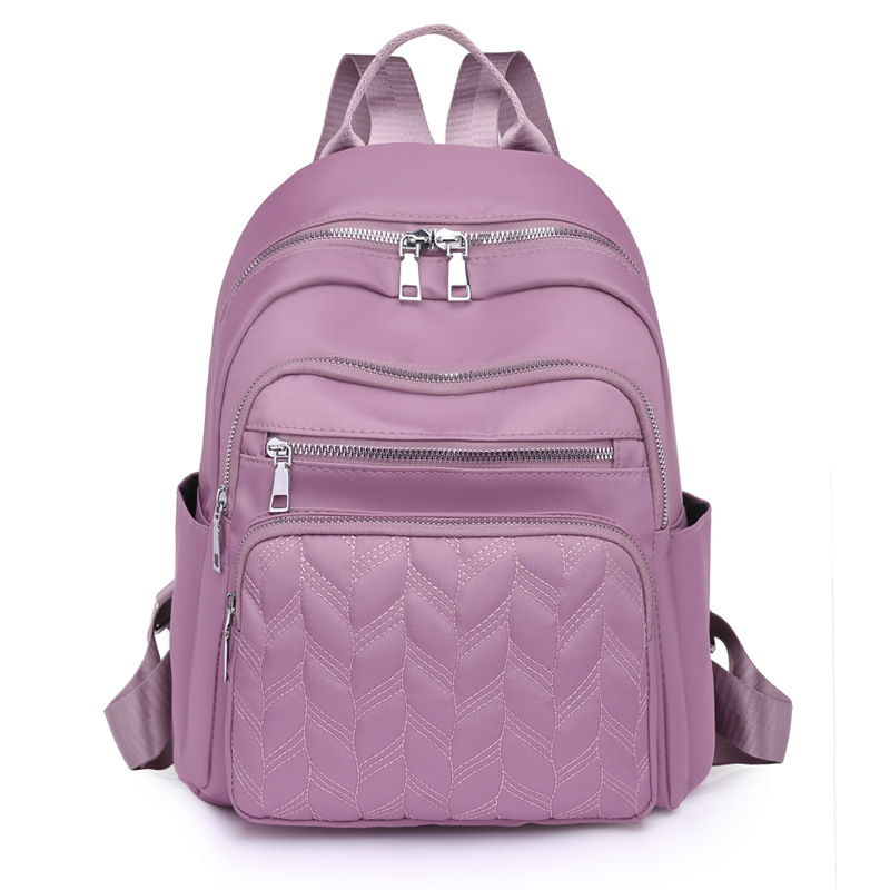2025 nueva mochila de nylon impermeable transfronteriza mochila de damas de transporte urbano de gran capacidad de moda mochila de estudiantes