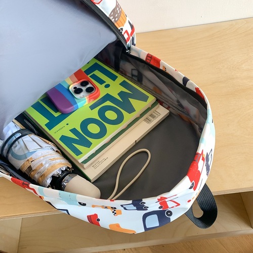 Unique versatile multi-item set backpack 2024 new pattern graffiti painted middle school student lightweight large capacity double shoulder bag
