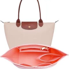 クロスボーダー竜ギョーザの袋の中の胆包は多くの仕切りを決めて内の胆包を収めることができます。