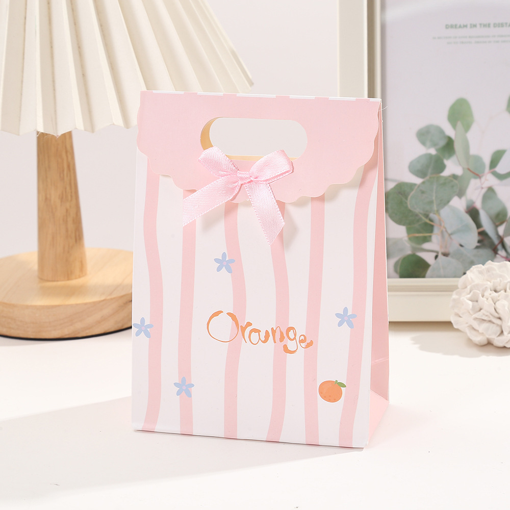 Bolsa de regalo de arco rayado de dibujos animados bolsa de embalaje de postre impresión en color Flip bolso de cartón blanco bolso