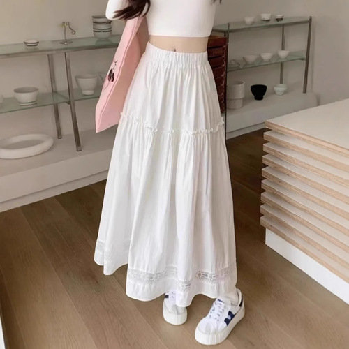White lace-trimmed half skirt with A-line large hem, loose-fitting high-waisted, suitable for summer with French style.