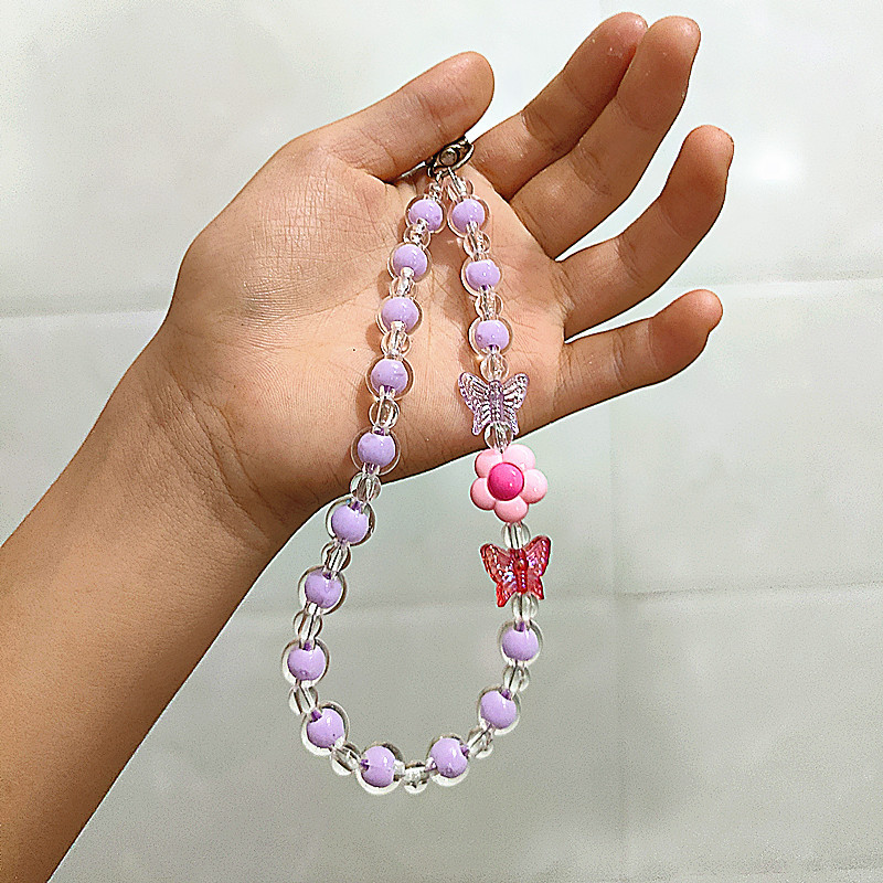 Flor Mariposa Caja del teléfono móvil Cadena con cuentas Douyin Bolso en vivo Auriculares Llavero Macaron Colgante Accesorios Cuerda