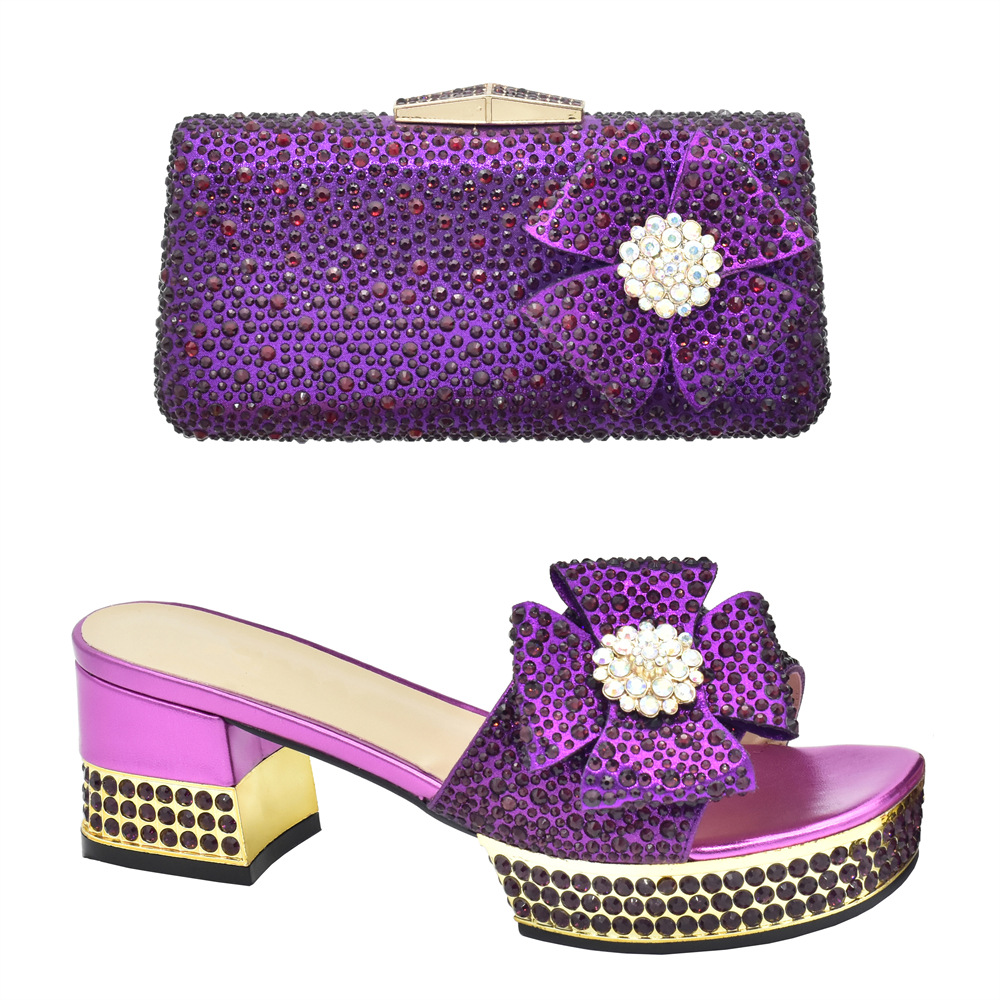 Accessorize the evening with applique studded high-heeled sandals and a full cloth small flash diamond dinner bag set with sandals_voghion.com