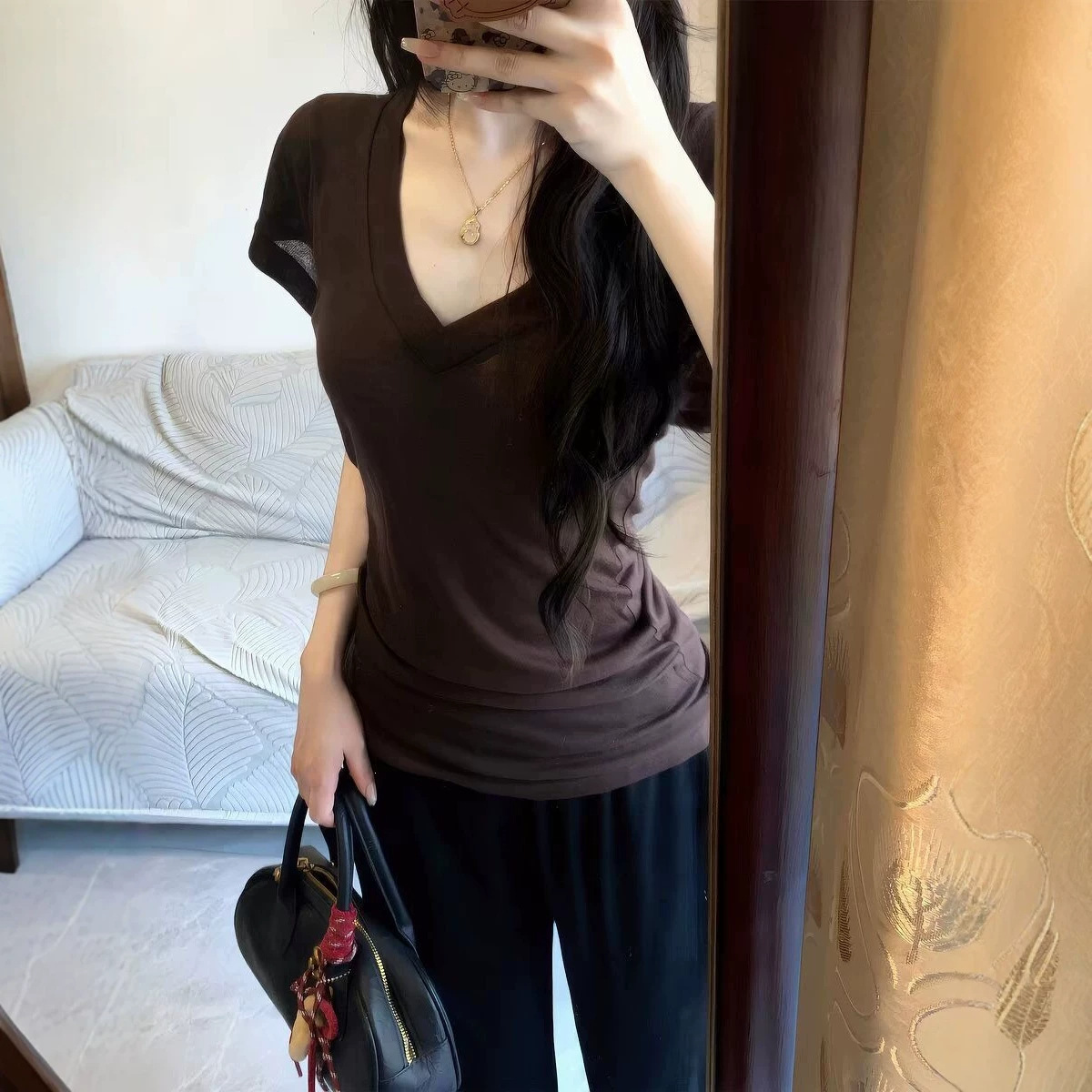 High-end, sexy, summery, Korean retro, and relaxed V-neck short-sleeved T-shirt for women, a popular style this year.