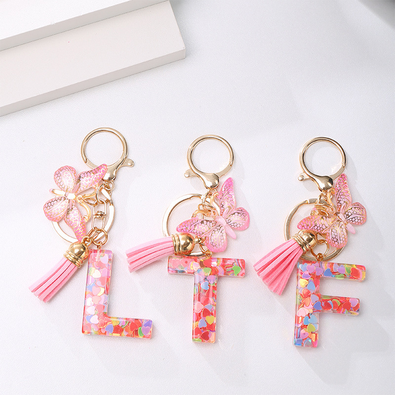 Amazon's best-selling resin 26-letter keychain pendant, fashionable and versatile, with sequins and tassels, a backpack accessory