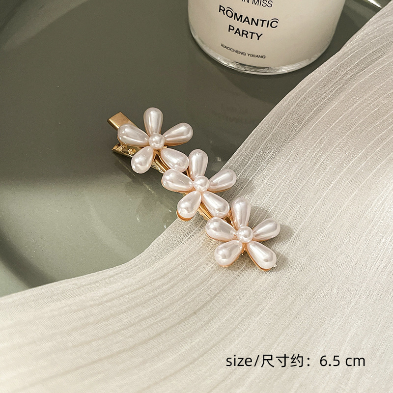 Corea del Sur clip para el cabello de perlas en línea clip para el cabello de mujeres rasgadas clip para el cabello de una palabra clip para el cabello de bordes fría BB clip lateral clip para el temperamento clip para la cabeza