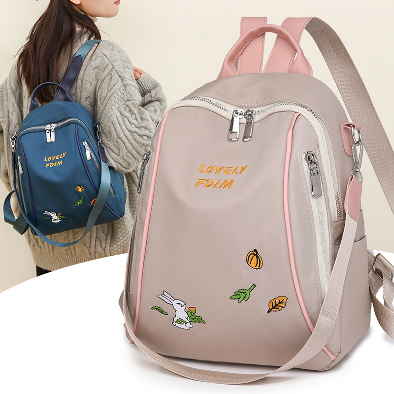 2024 nueva mochila casual para mujer de nailon moda linda multifuncional de viaje al aire libre mochila de doble uso al por mayor