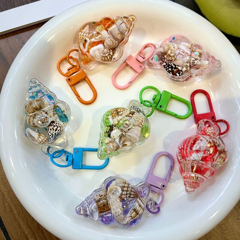 Manufacturer Wholesale Creative Conch-Shaped Liquid Quicksand Keychain Pendant for Children's Backpacks and Girls' Bags Accessories Manufacturer Wholesale Creative Conch-Shaped Liquid Quicksand Keychain Pendant for Children's Backpacks and Girls' Bags Accessories
