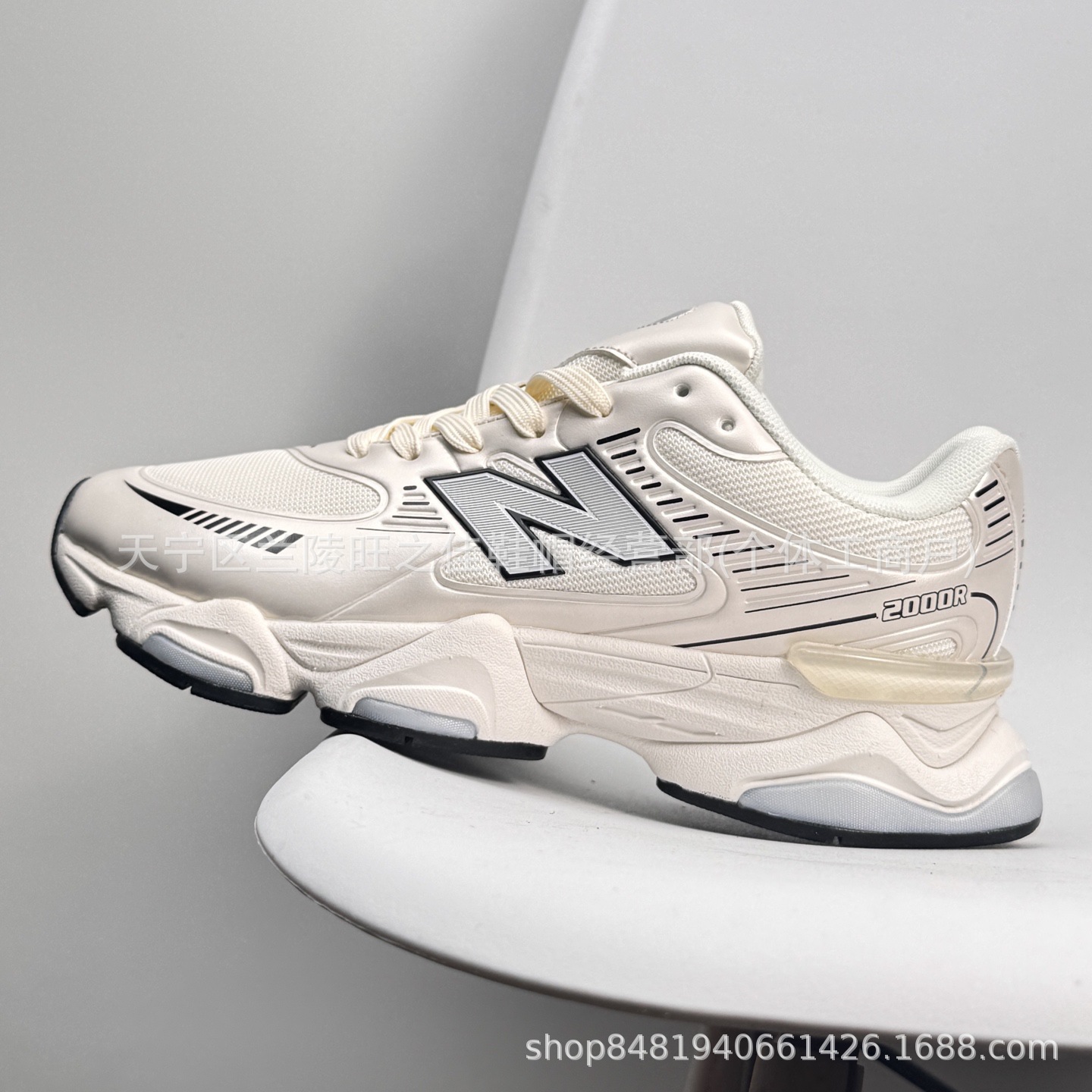 Putian NB M2000 serie de moda versátil tela de cuero artificial de cerdo amortiguador antideslizante desgaste zapatillas de correr bajas
